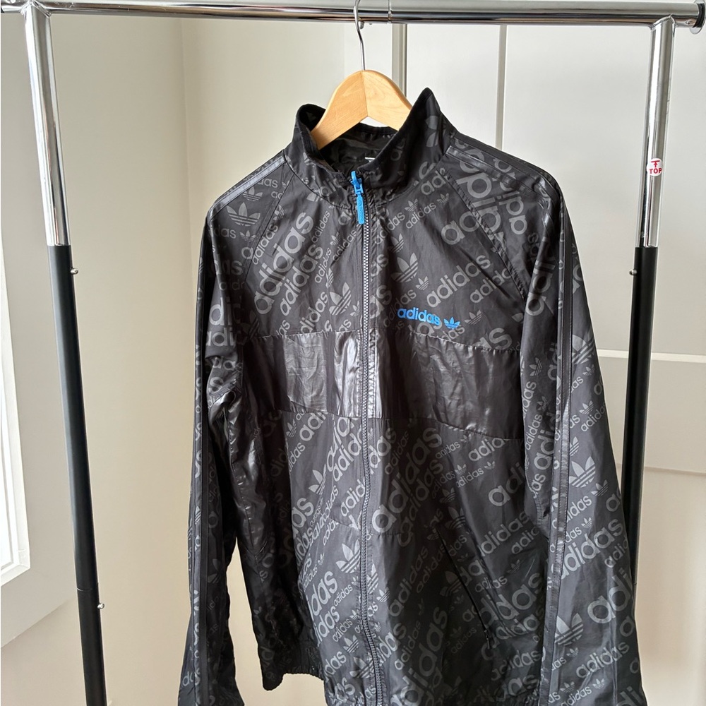 Adidas Black Performance Jacket with Blue Accents